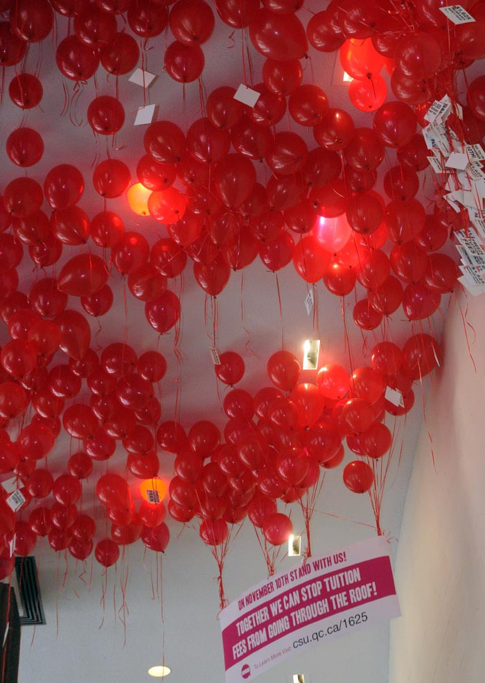 1000 Red Balloons Floating in the Hall Building